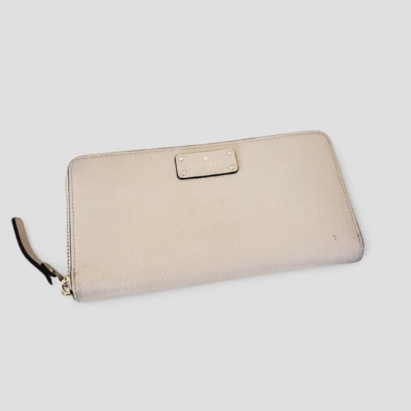 kate spade Handbags - Kate Spade Cream Leather Zip Wallet